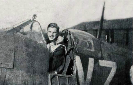 Pilot Officer John Gillespie Magee Jr in the cockpit of 412 Squadron Supermarine Spitfire - RAF photo