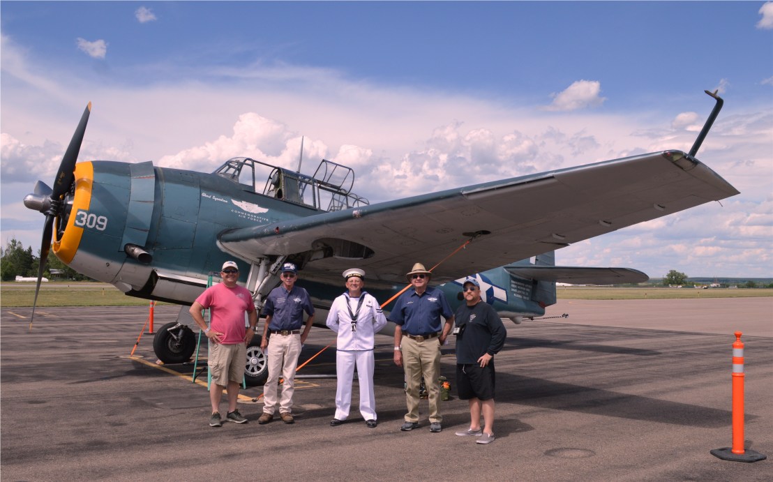 Avenger 53503 & RCN Leading Seaman reenactor & RMW officers & TBM pilot Chris Ryan (in red T-Shirt) - 15 June 2019 by John T Stemple
