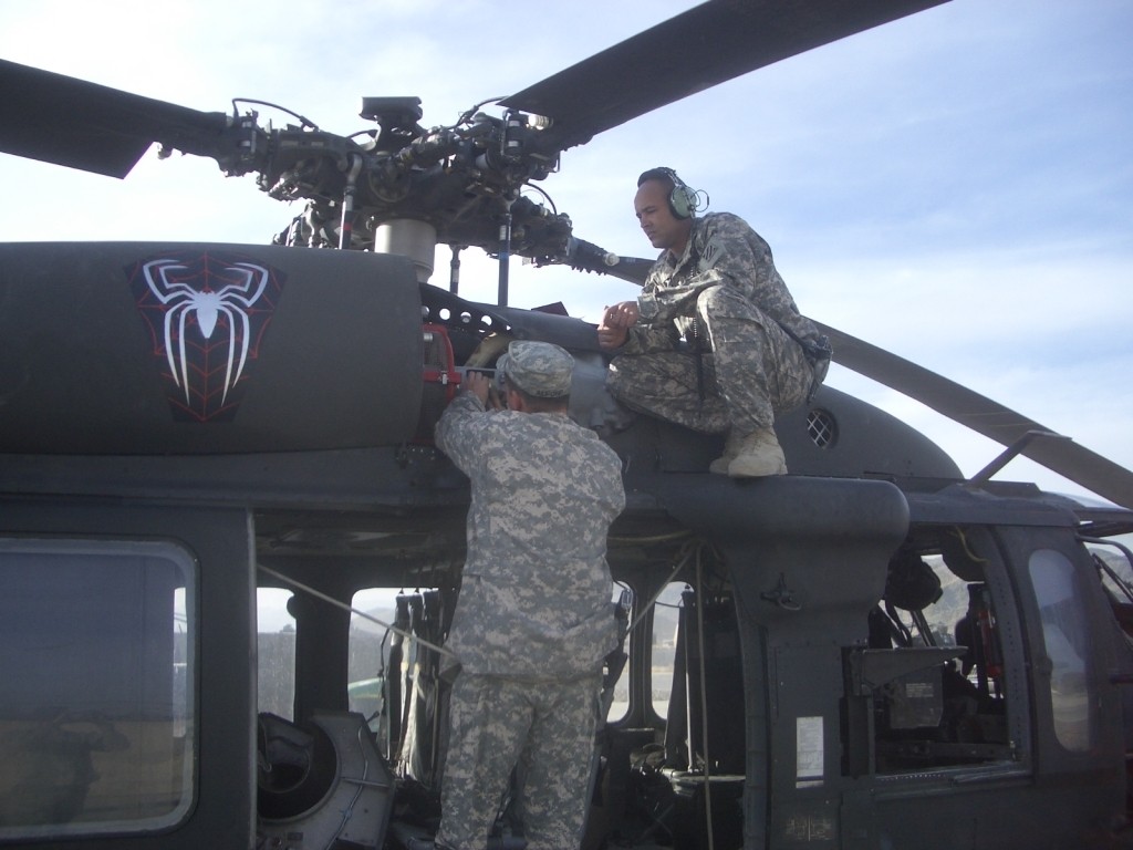 Chief Warrant Officer Ed Griffie and Chief Warrant Officer Greg Alford with Company A 'Spiders' 4th Battalion 3rd Aviation Regiment 1st Battalion 3rd Aviation Regiment Task Force Viper - US Army photo